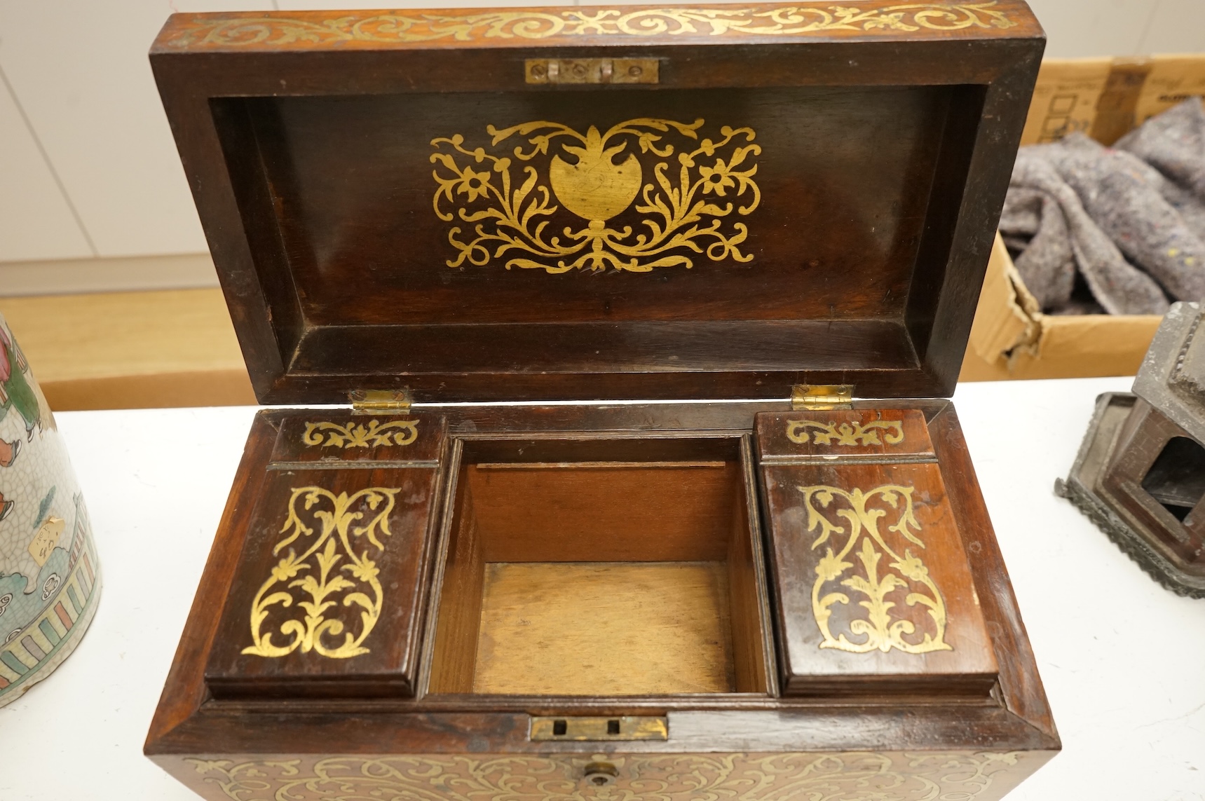 A William IV rosewood and cut brass inlaid tea caddy, 32cm wide